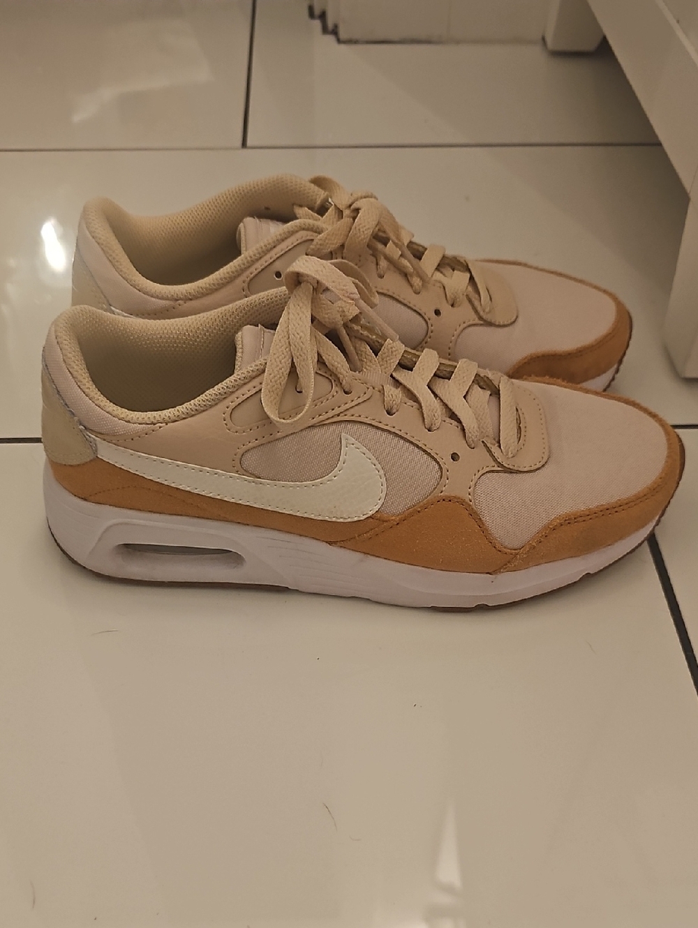 Nike Low-Top Sneakers in Cream & Tan with White Swoosh